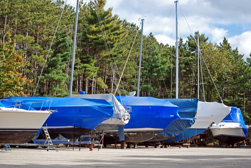 Boats under a cover, being stored away